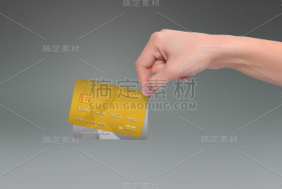金色和银色的信用卡在灰色的手里