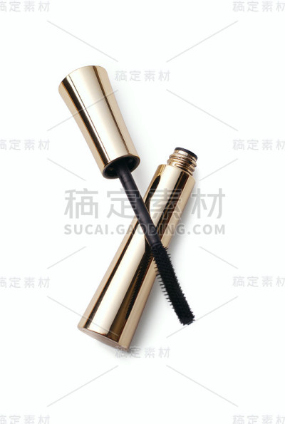 打开睫毛膏在磨刀背景