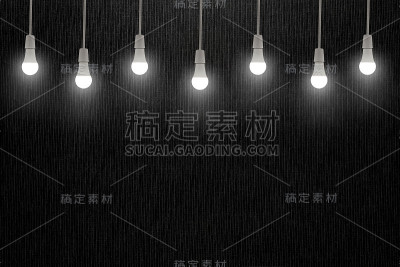 灯泡在深灰色纹理背景