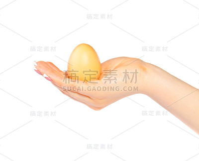 女人的手拿着鸡蛋