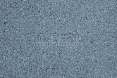 复古纸纹理硬纸板背景特写，深蓝灰色。可回收材料，含有少量纤维素