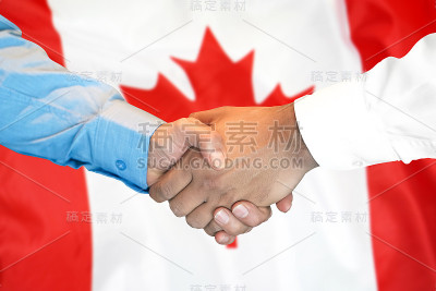 以加拿大国旗为背景的握手。