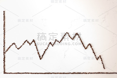 股票交易所的图形折叠制成的咖啡豆显示