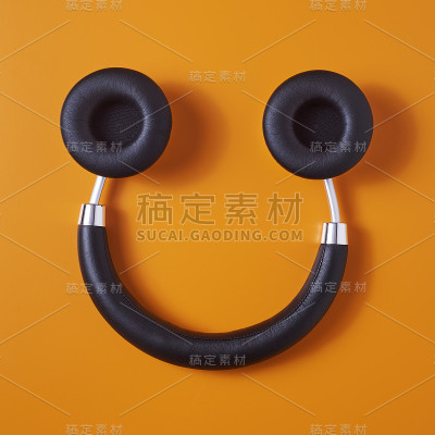 橙色背景的无线耳机