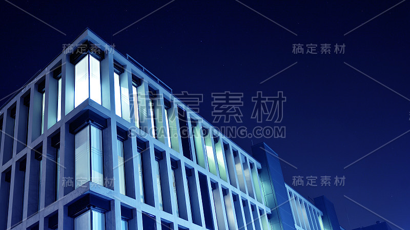 夜景建筑-玻璃幕墙的建筑。商业区的现代建筑。经济学、金融学的概念。