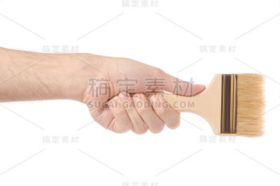 手里拿着油漆刷