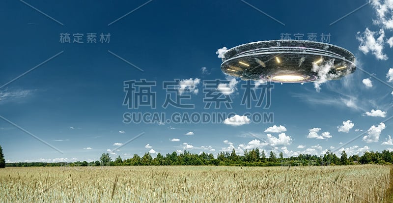 UFO，一个在田野上空盘旋的外星人盘子，静止地盘旋在空中。不明飞行物、外星人入侵、外星生命、太空旅行