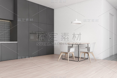 厨房角落，有灰色的台面和桌子