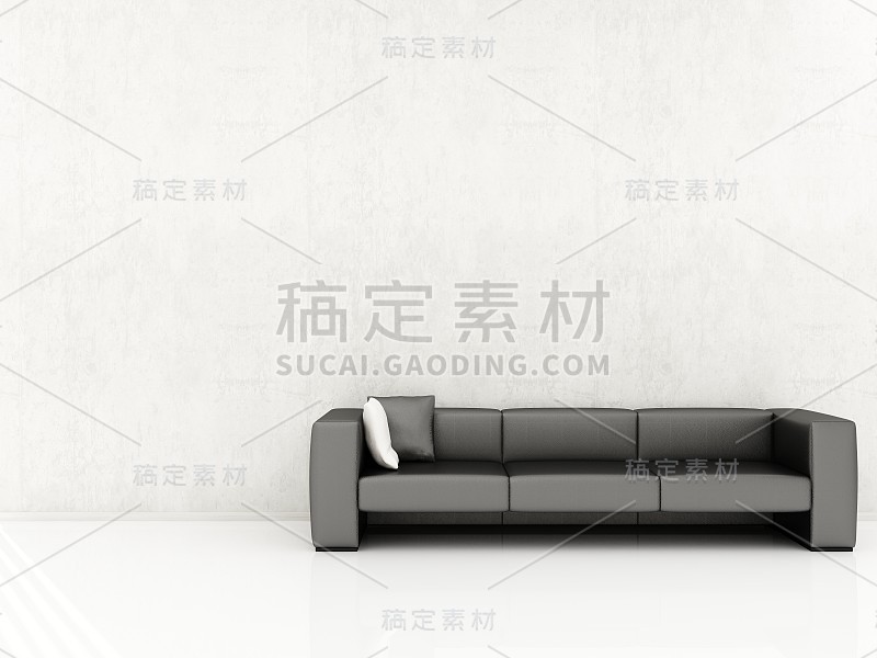 沙发面对一堵空白的墙