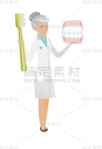 有牙颌模型和牙刷的牙医