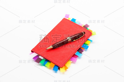 红色的抄写本和红色的笔