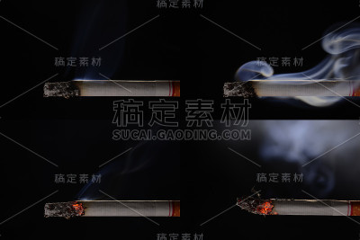 在黑色背景上点燃并燃烧着的香烟