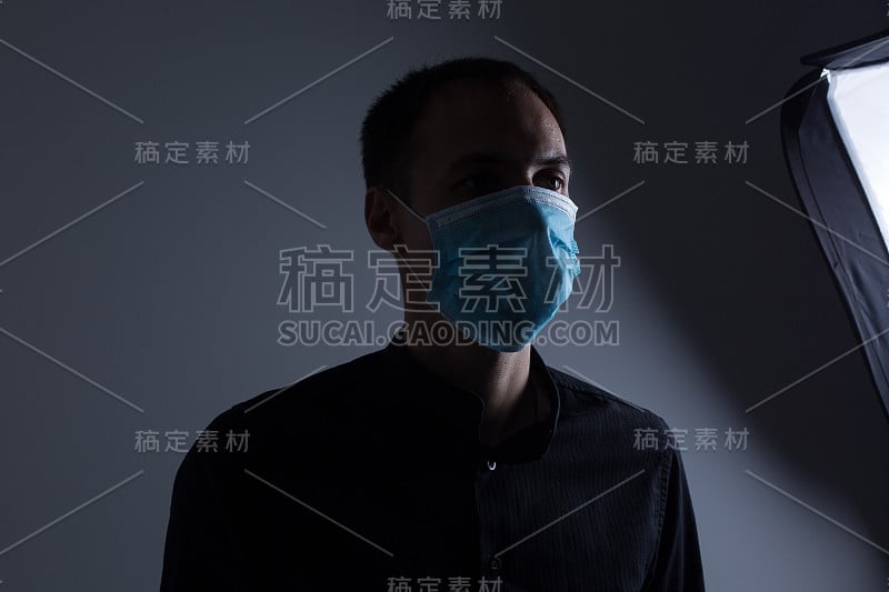 戴着防护面具的人H1N1病毒