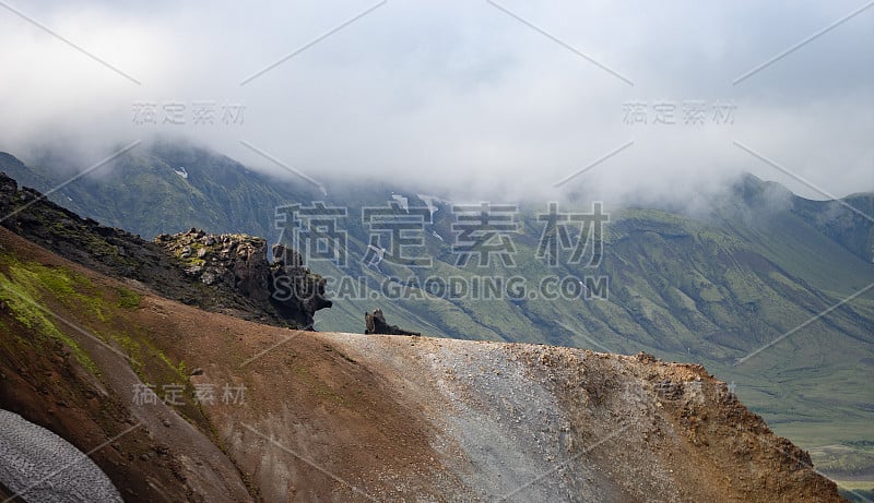 View mountain valley with green, foggy hills. Laug