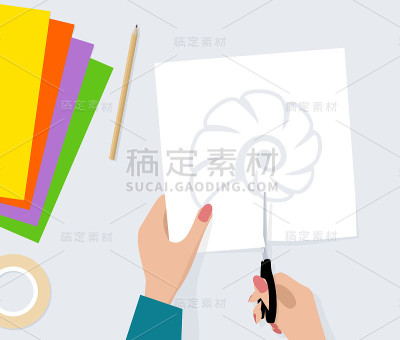 女性用剪刀从纸上剪出贝壳的剪影