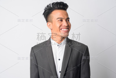 面对快乐的年轻亚洲商人西服思考