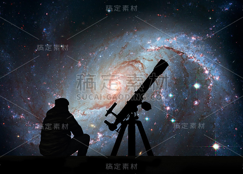 用望远镜看星星的人。恒星托儿所ngc1672。剑鱼座中的螺旋星系