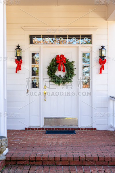 Front Porch and door decorated for the Christmas h