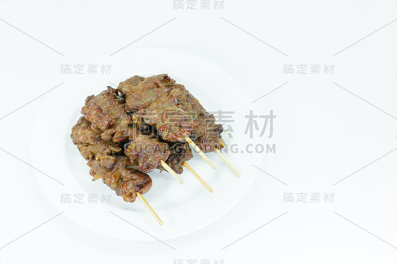 白底竹签烤猪肉