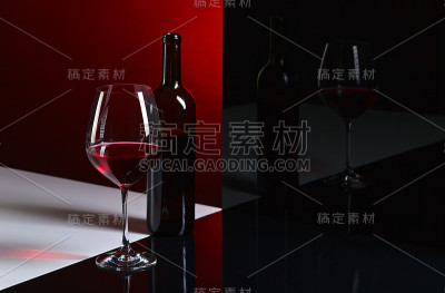 瓶子和玻璃杯都有红酒