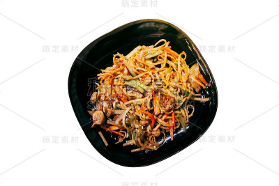 日本菜放在黑色的盘子里，孤立无援