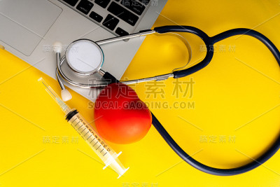 具有医学概念的听诊器和注射器。