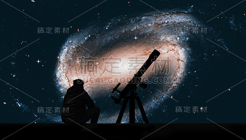 用望远镜看星星的人。波江座ngc1300中的螺旋星系