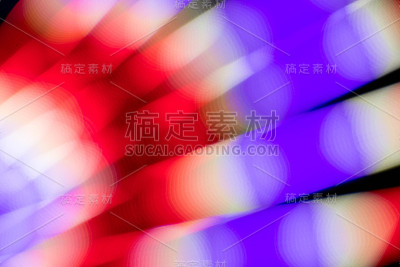 摘要在黑色背景上多色荧光辉光
