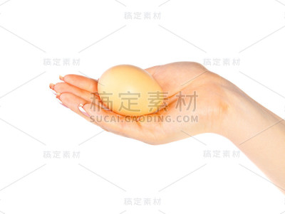 女人的手拿着鸡蛋