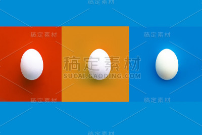 红色、橙色和蓝色的长方形拼贴画，上面有三个白色的鸡蛋。