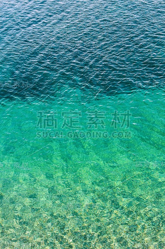 Transparent seabed and calm water. The color trans