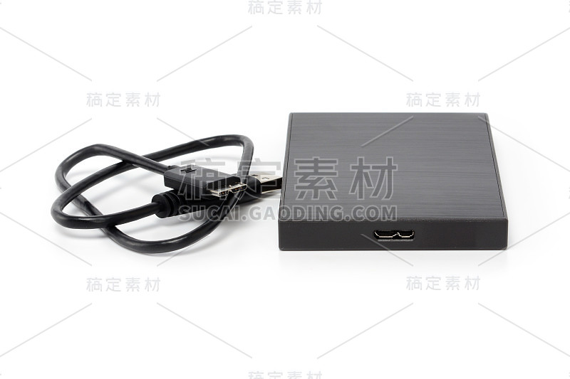 外接硬盘驱动器盘usb 3.0电缆。在便携式硬盘上存储数据的最佳方式。特写，孤立的白色背景，全景深的