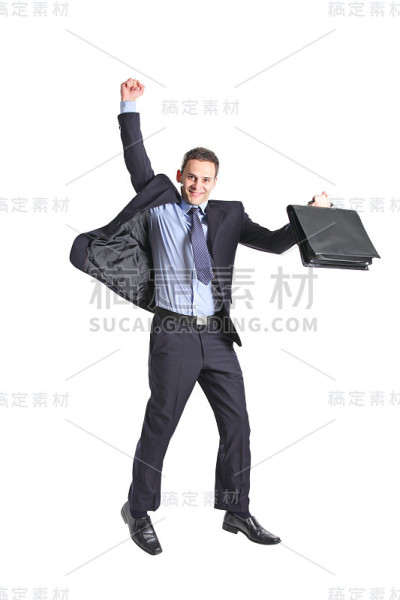 快乐的年轻商人在空中跳跃