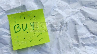 以商业和金钱为主题的物品照片，附注上写着“购买”。
