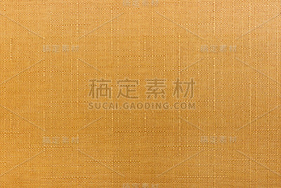 橘色棉织物抽象纹理，纵横线条。天然纤维的背景