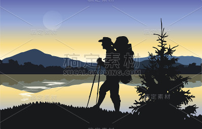 一个游客的剪影在山和水的背景