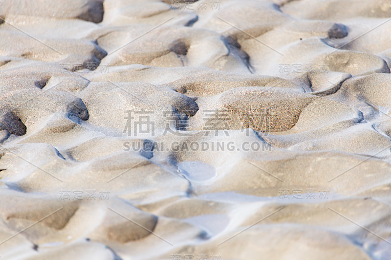 沙滩上的沙子在大自然的背景