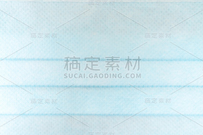 带橡胶耳带的外科口罩。典型的三层外科口罩，用以覆盖口鼻。防止细菌滋生。保护的概念。