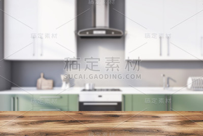 模糊的灰色厨房里的桌子和台面