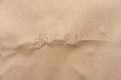 皱巴巴的牛皮纸背景。纹理的概念。