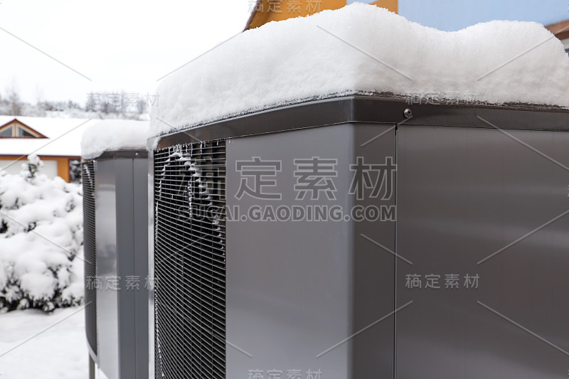 Two residential modern heat pumps