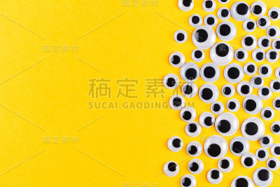 在黄色背景上的google塑料眼睛模式。平的。