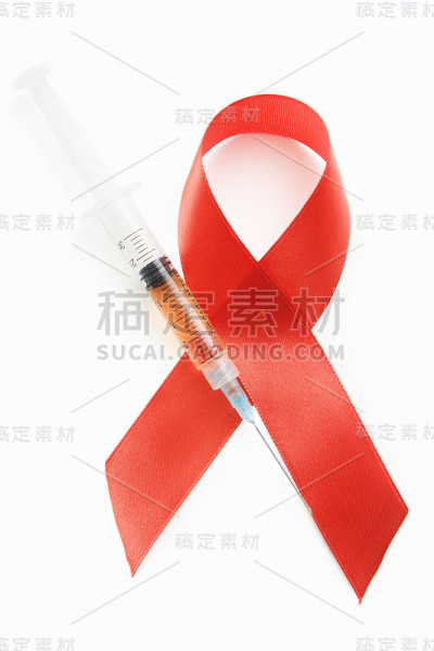 艾滋病红丝带标志和注射器