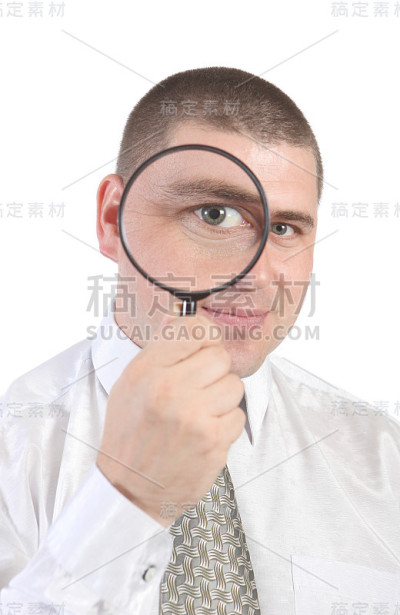 带放大镜的商人